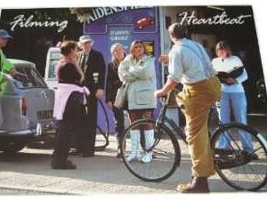 Postcard - Heartbeat's (some of cast outside Scripps' Garage)