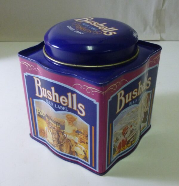 Bushells 'Australian Travel', blue on magneta, 250g. Tea Tin, c.1983