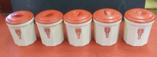IPLEX Spice Canister Set of 5, Deco, in red on ivory bakelite, c.1940's